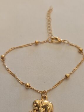 Gold-Tone Elephant Pendant Bracelet